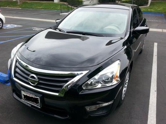 My shiny Nissan Altima. There's a few calcified spots on the car, but this is good enough to impress