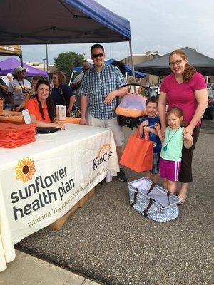 Sunflower has been hosting Farmers Market Member Days throughout Kansas where we give free fruits and veggies to our members.