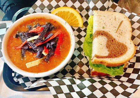 Chicken tortilla soup and chicken salad sandwich on rye