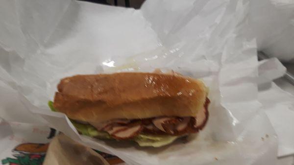 1/2 Turkey Sub with lettuce,  tomatoes,  onions,  pepper Jack cheese,  oil and mayo.