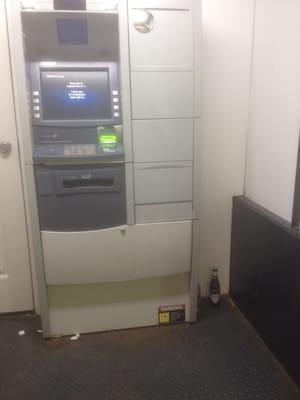 Trailer ATM on site! Sweet discarded beer bottle on the lower left of ATM!!