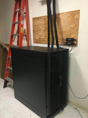 This project called for a portable server rack allowing network equipment to be easily moved.