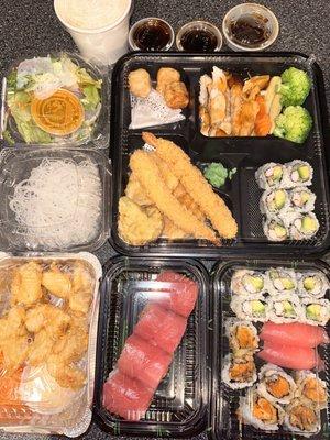 Chicken teriyaki bento box, Staten Island roll, California Roll, sweet potato roll and rock shrimp appetizer.