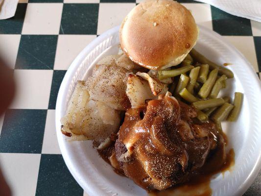 Friday special, hamburger steak with mushroom gravy. Delicious