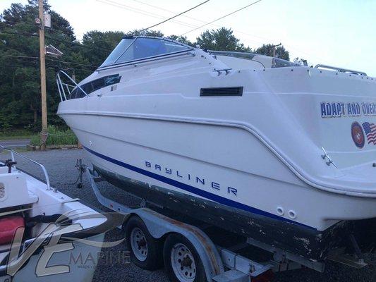 Custom stripes and manufacture logo on this Bayliner