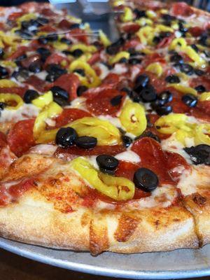 The pizza is so perfectly cooked, the crust is delicious, toppings are all amazing!