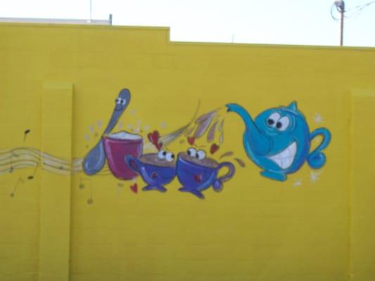 THE MURAL ON THE OUTSIDE OF THE STORE