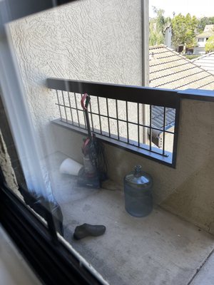 Neighbors leaving trash on balcony