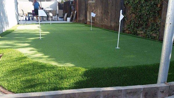 Putting green installation.