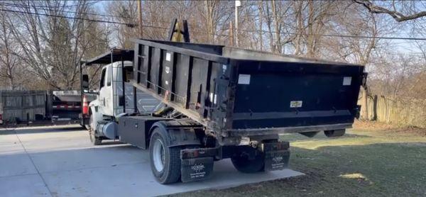 Preparing our dumpster truck before delivery.