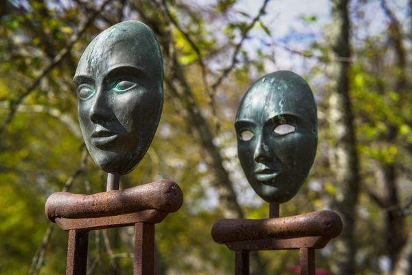 An interesting sculpture of face masks on crutches by local artist Troy Kelley. Titled "Handicapped Masks"