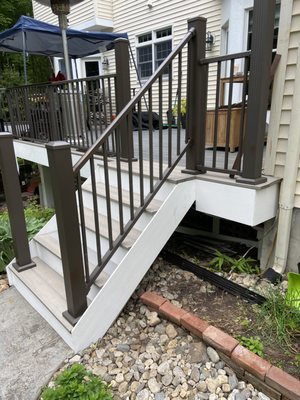 Rebuilt the stairs To make them wider and stronger to accommodate the new aluminum posts.