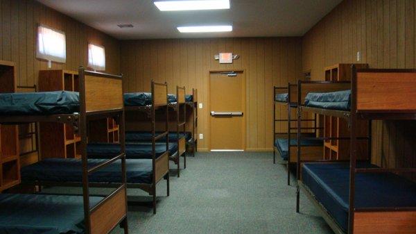 We have 4 Cabins all with HVAC, full bathrooms that can sleep 18 on 2 sides, 36 in total for each cabin.