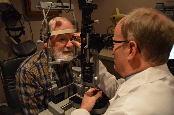 Dr. Givens performing an eye exam