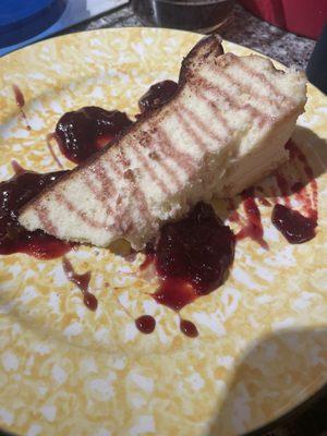 Basque burnt cheesecake with cranberry agradolce and luxardo cherry sauce.