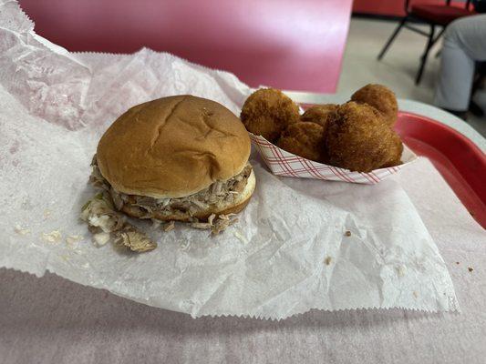 BBQ Sandwich with Vinegar Slaw and  Hushpuppies