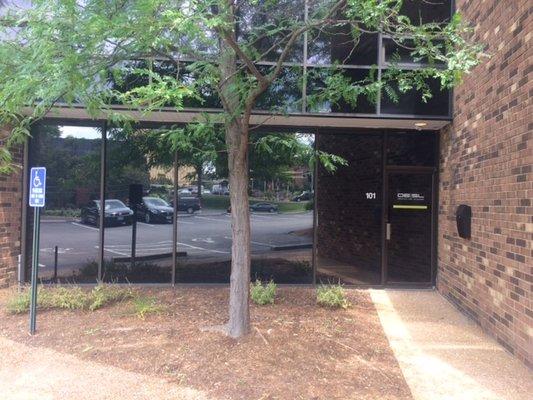 Office glass Entrance on West side lower parking.