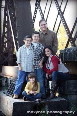 Dianna took this photo of our family on a rustic, historic bridge.