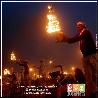 Witness the traditional Aarti ceremony performed every evening at dusk on the ghats of river Ganges in India three holiest places Varanasi