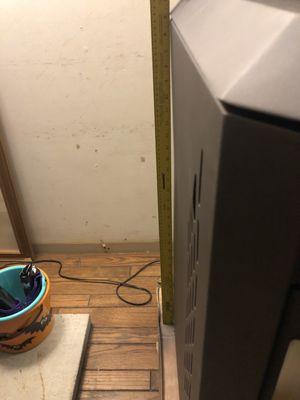 1st Stove - Dent in side of door, couldn't open.