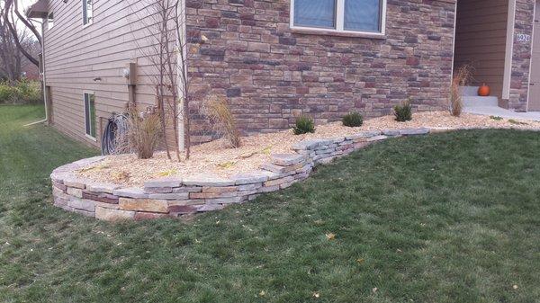 Chilton Limestone Retaining Wall by Stewart Landscapes, Inc. Johnston, Iowa