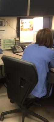 This nurse was on a personal call for several minutes while vets waited to be served.