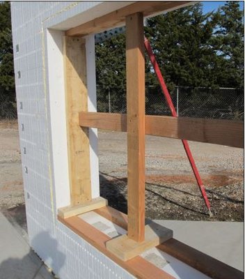 BuildBlock Build Bucks wrap window and door openings to ensue no thermal bridge.  Pictured is a reinforced window opening after pour.