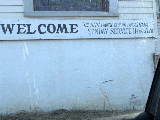 Signage on church on the side near the Little Pantry I was looking for to donate food in.