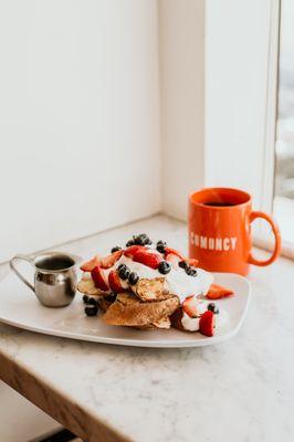 French Toast topped with greek yogurt and fresh berries!