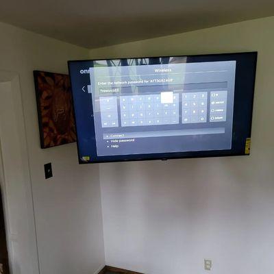 65" outlet relocation behind tv for the no wire look on a full motion mount