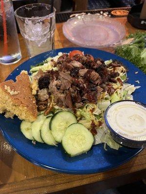 Brisket salad  comes with cornbread and sweet potato fries underneath! I got ranch with mine and it was really good ranch