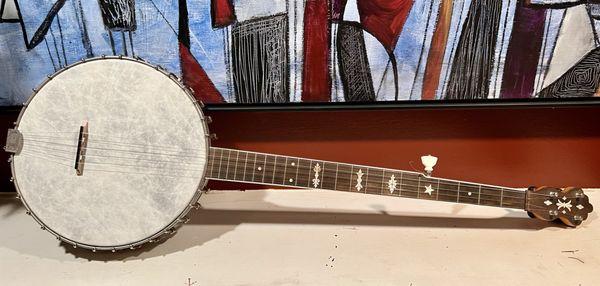 Restored 1927 Silvertone Banjo. New head, new bridge, adjusted action. Quality work through and through.