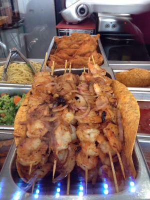 Fresh grilled shrimp skewers can be used to build salads, wraps or paired with their many side dishes. Yummy!