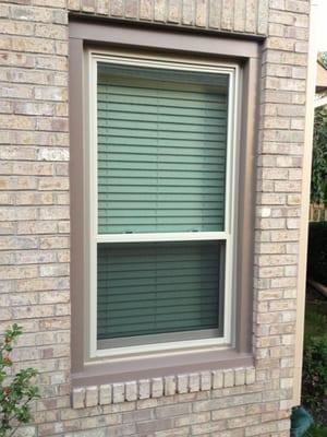 Energy star rated vinyl window installed to replace old rotted wood window.