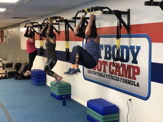 Building strong abs with hanging knee raises.