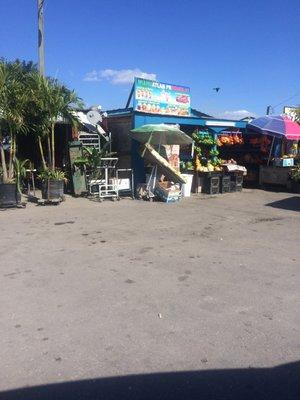 One of the many vendors at Immokalee produce center.