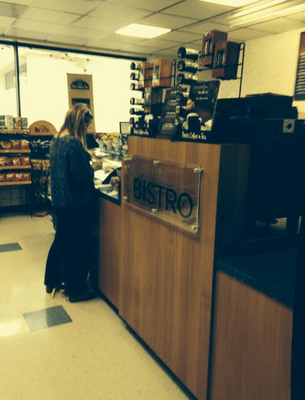 Beloved and loyal patron, Anne Waldrop, buys a signature cup-o-joe on a foggy morn.