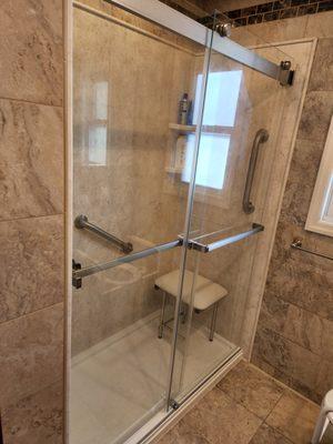 We had the pull down seat installed. Note: the window is on the outside wall, what you see is the reflection in the beautiful shower doors.