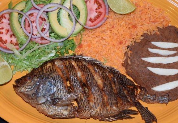 What do Mexicans order? The #7 Mojarra Frita, of course! Talapia is fried whole and served with rice, beans, special salad & tortillas!