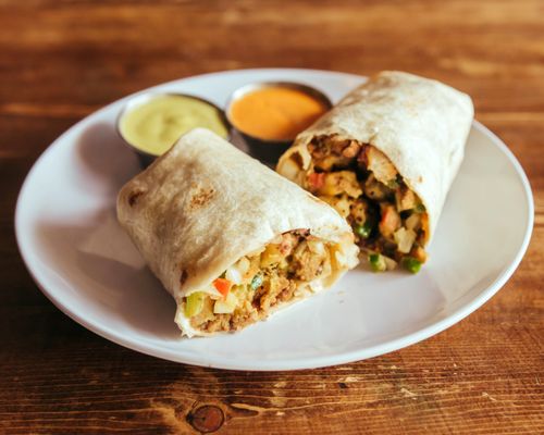 Verde Burrito: Carne Asada, Potatoes, Black Beans, Verde Sauce, & Flour Tortilla