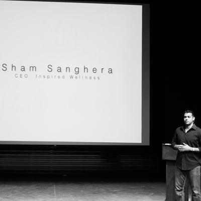 Founder & CEO Sham Sanghera giving a presentation on holistic, natural weight loss.