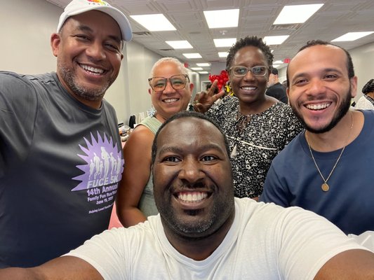 Guests attending the Juneteenth Celebration with Derek, owner of Suite Metuchen.