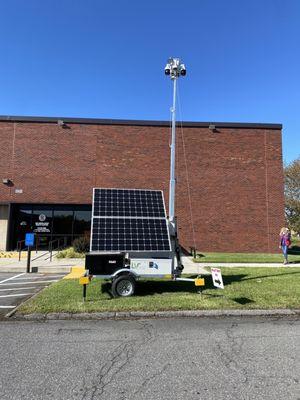 Part of the security for the ballot drop box and its surroundings.