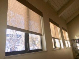 Beautiful motorized shades provide privacy and light filtering for this Boulder townhome.