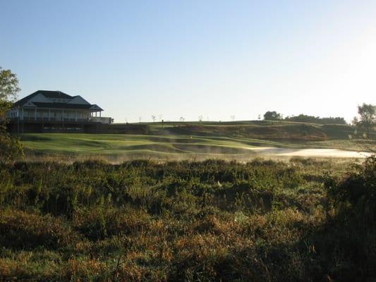 Hole 7 Par 3 with clubhouse