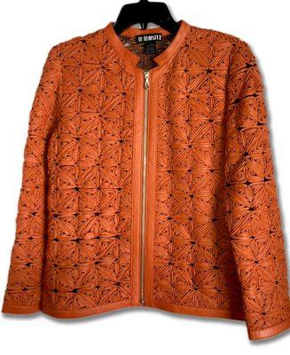 Laser-cut intricate design leather jacket.