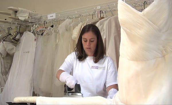 Bridal gowns are hand pressed