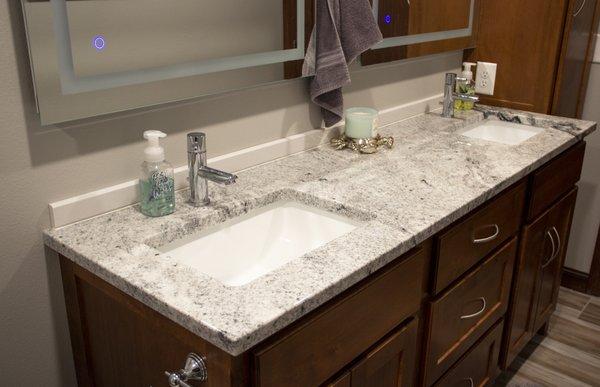 Viscon White granite vanity top with undermount sinks