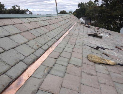 New copper roof flashing installed