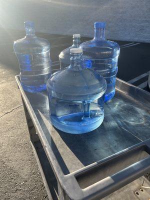 3-GALLON BOTTLES - EASIER ON MY BACK.